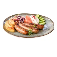 Grilled sausages with roast potatoes