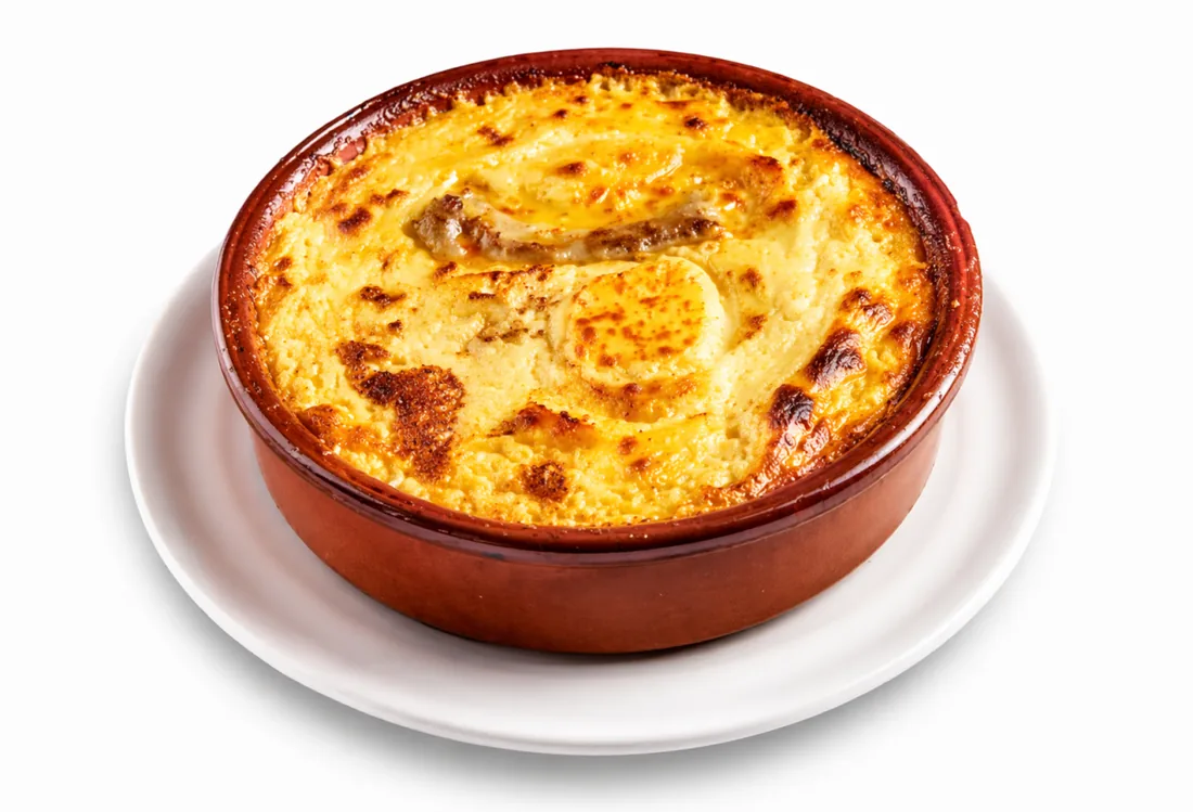 Tave Kosi — baked chicken and yogurt, Albania's national dish
